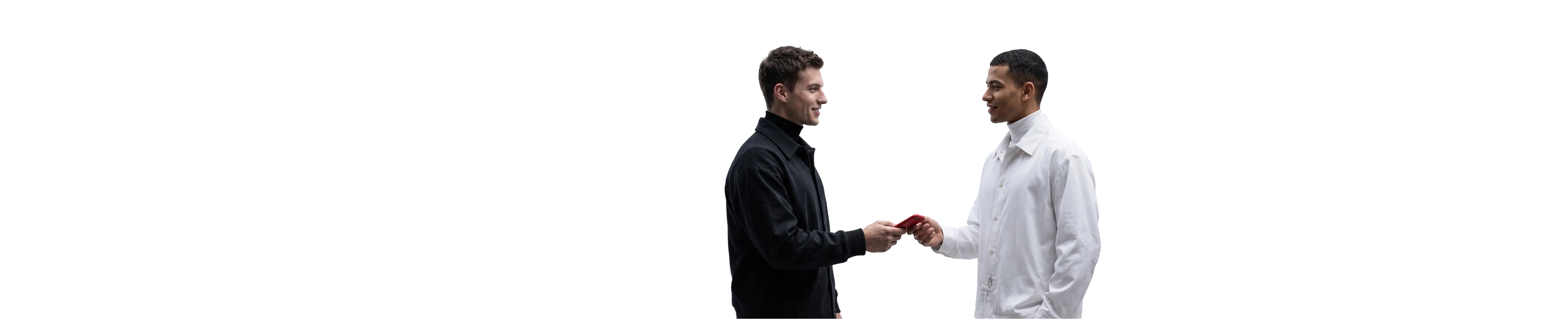 two people exchanging a smartphone